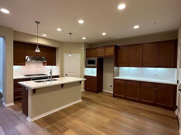 Spacious Kitchen with Walk-in Pantry and Dining Area