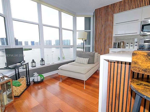 3rd image of 3600 Mystic Pointe Dr APT 718