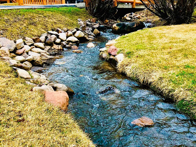 Beautiful stream of water flows through community