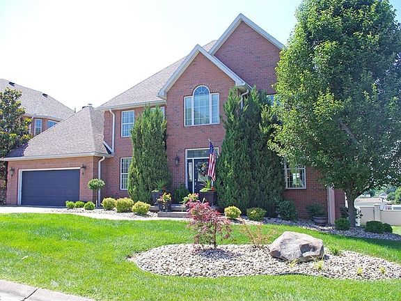 Irrigation sprinkler and security system.  Stamped extra wide driveway.