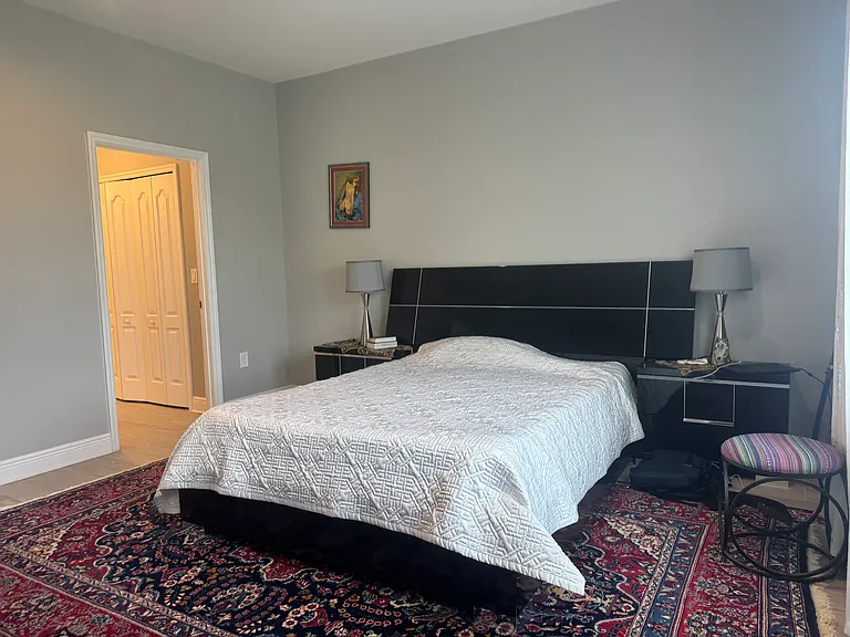 Bedroom 1, entry to closets and bathroom