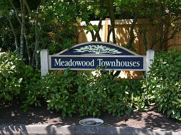 Welcoming landscaping in exterior.