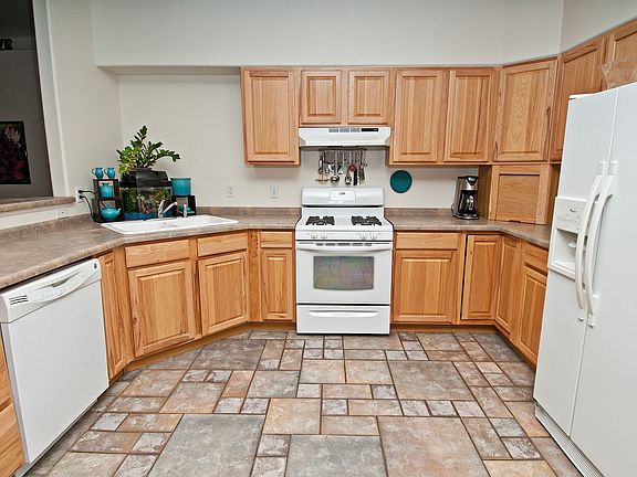 Kitchen Featuring Tile Flooring