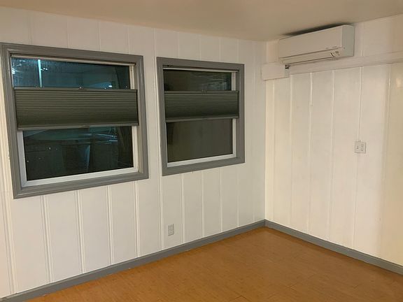 Living room with mini-split AC and heat.