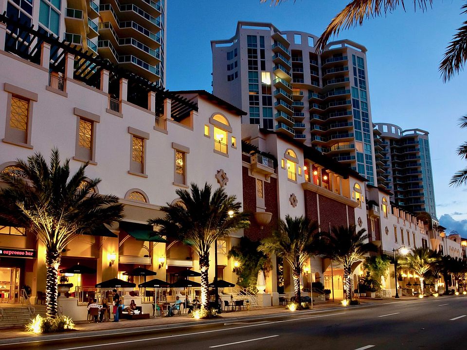 Towne Center - The New Street-Side Promenade of Sunny Isles Beach The sound of cascading fountains and brilliant hues of bougainvillea create a sense of enchantment as you stroll shady pathways through lush gardens to intriguing cobblestone piazzas.