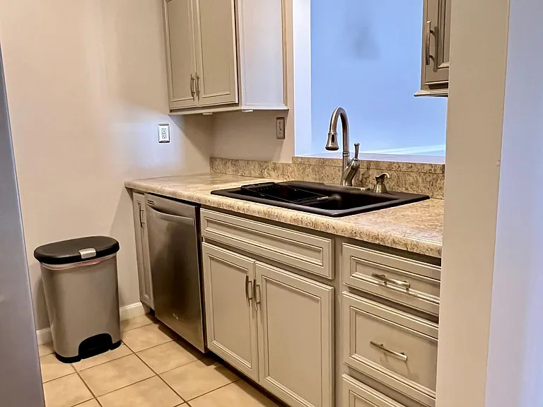 Updated cabinets with soft close doors, great countertops