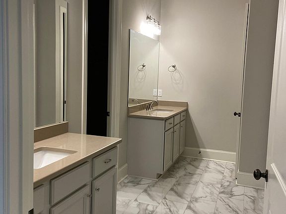 Master bath with large closet, separate tub and shower.