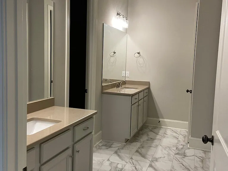 Master bath with large closet, separate tub and shower.