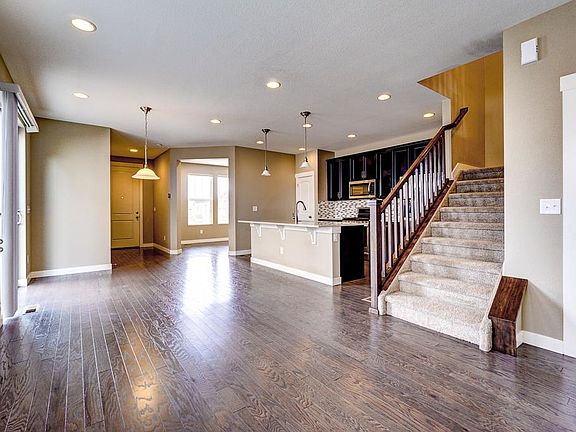Family area looking towards front entry & office. Kitchen is on the right.