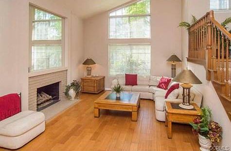 Formal Living Room with lots of light and fireplace