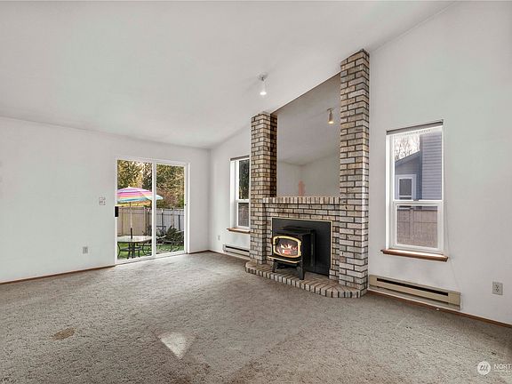 Slider access to the rear patio from family room. >