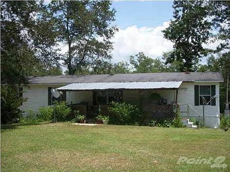 DOUBLE WIDE LOCATED ON PROPERTY