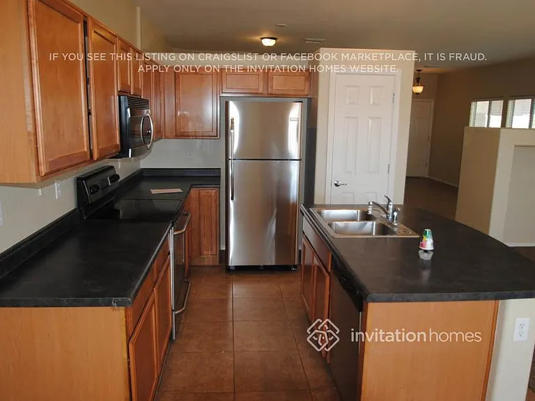 10209 W Parkway Dr — Photo 4