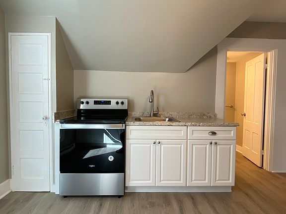 Recently updated kitchen with broom closet