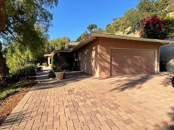 Garage and paver driveway