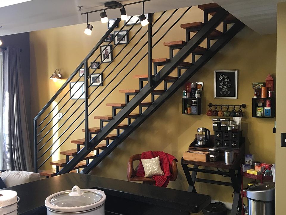 Under the stairs is perfect for an office, coffee/tea nook, work out area, etc.