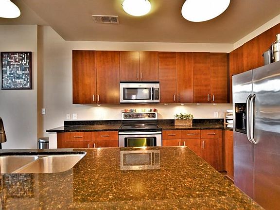 3rd image of 711 Cosmopolitan Dr NE Unit 325