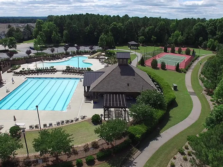 Highland creek is the envy of other neighborhoods, boasting an olympic size pool, secondary children's pool with a slide and splash pad, tennis court and walking trails, soccer field and large clubhouse with a gym.