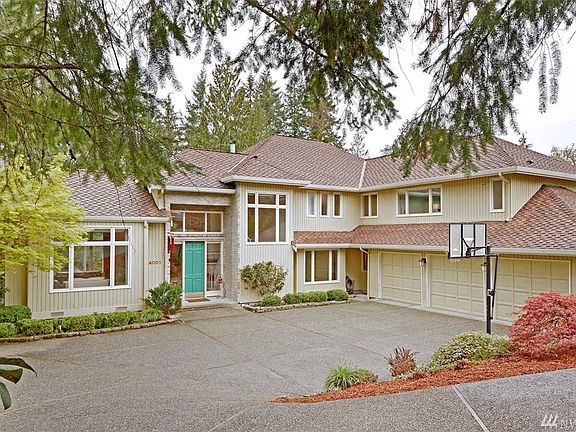 Wonderful NW Contemporary 2 story w/basement home with beautiful serene setting backing onto greenbelt in desirable Broadmoore Estates in the heart of Sammamish.  