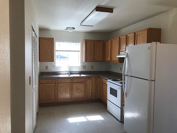 kitchen (laundry area behind doors on left)