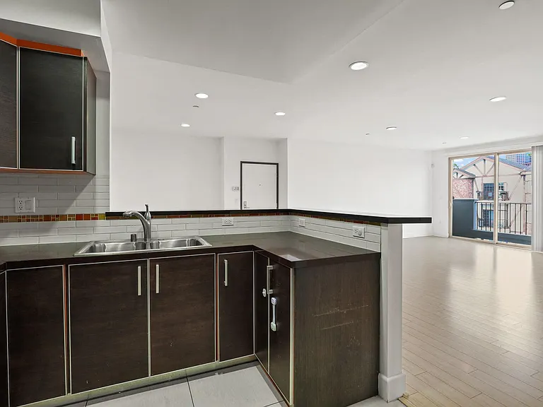 Open-Concept Kitchen, Dining, and Living Room Areas