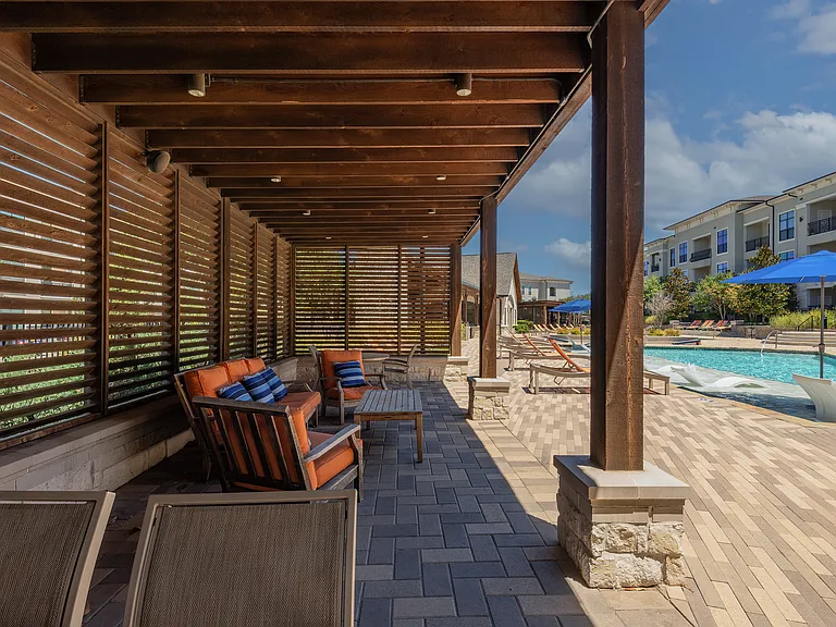 Relaxing Poolside Pergola at The Hendry Apartments