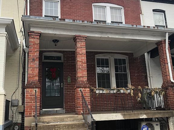 View of the house and basement entrance (the holiday garland has been removed!)