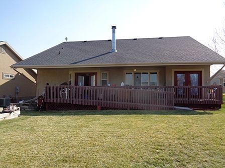 Back of home showing deck