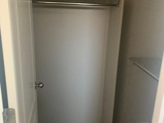 walk-in closet attached to master bathroom
