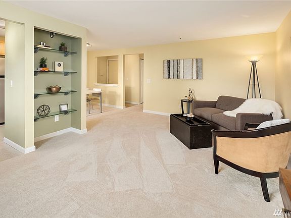 Glass shelving unit - Option: Remove shelves and hang a TV!