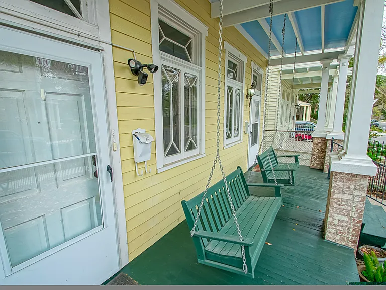 Polywood Porch Swing (never needs to be painted, looks like wood but is actually made primarily from high-density polyethylene plastic lumber. (smooth on skin, no splinters, no paint flakes because the polyethylene is primed and painted freom the factory)