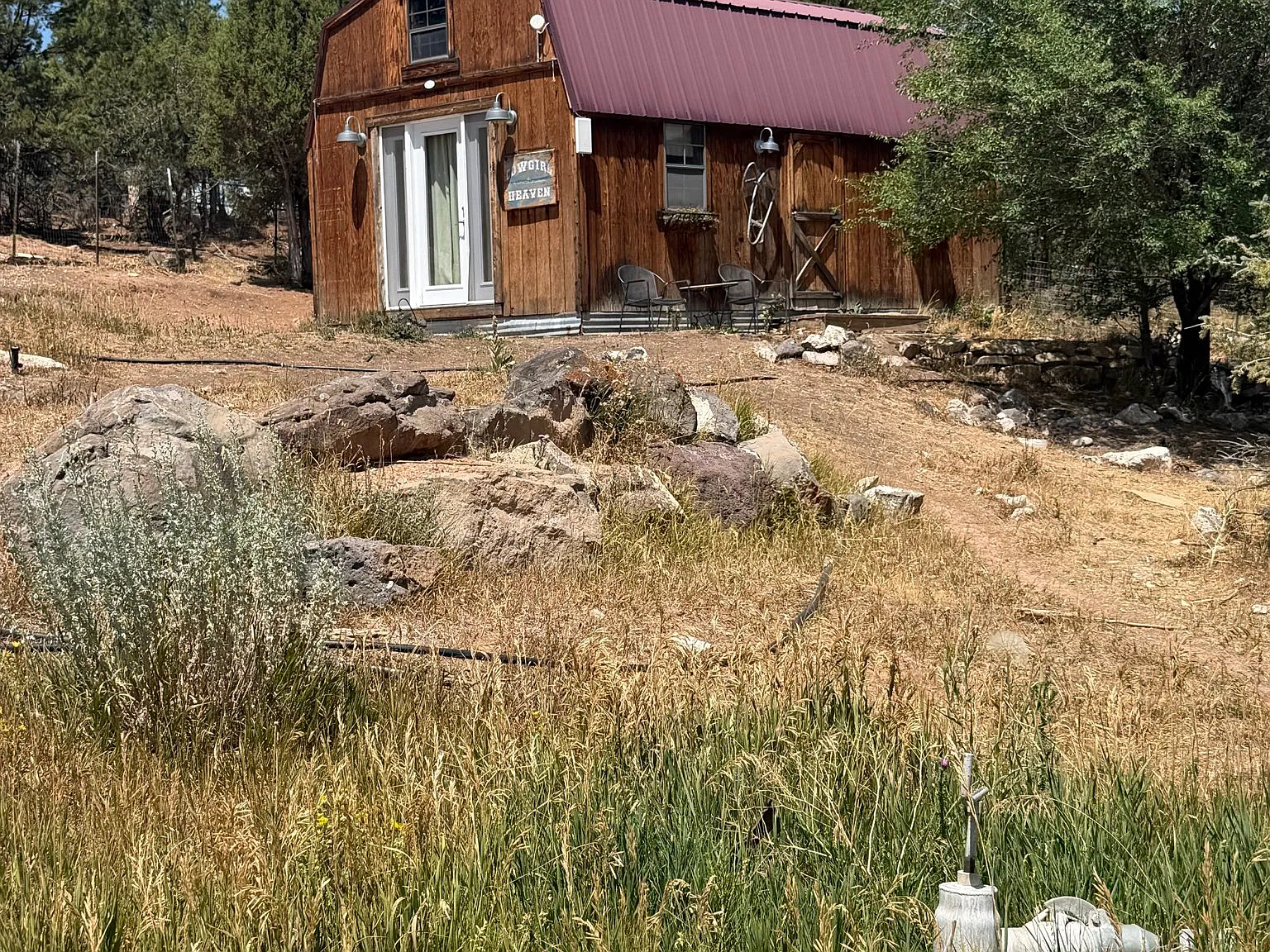 This darling cabin sits on an 80 acre ranch just 20 minutes to Carbondale. There is an indoor horse. — Photo 4