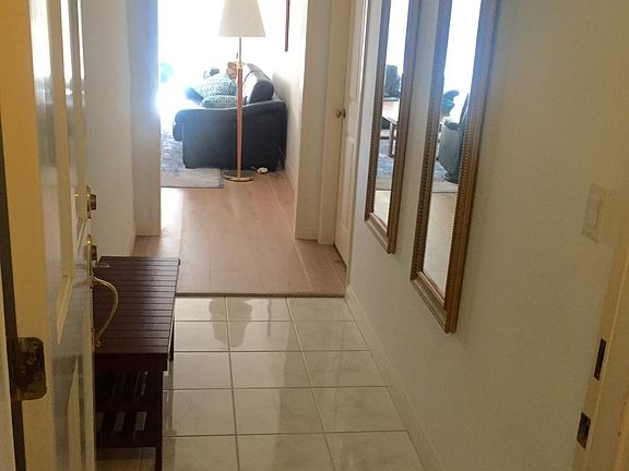 Entrance foyer with two mirrors