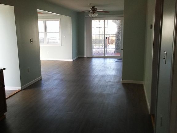 Open concept living, dining and kitchen area.