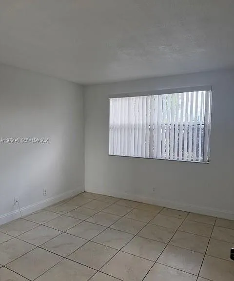 8781 Wiles Rd #103 — Photo 15