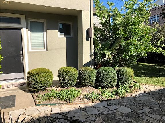 As you enter the front gate, before you even notice the front door, you will notice the stone front patio that draws your attention towards the amazing outdoor space that this home enjoys.