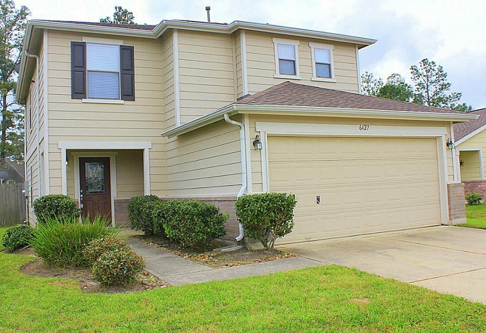 Welcome home to 6427 Lily Hollow Court!