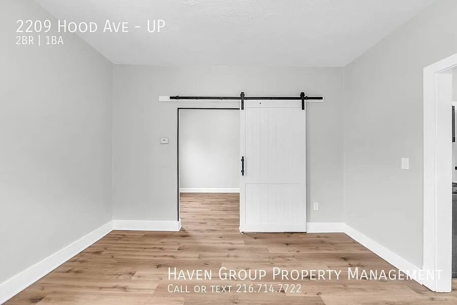 2209 Hood Ave | UP, Cleveland, OH 44109- Spacious 2-bed 1-bath multi-family home! A minimum credi... — Photo 2