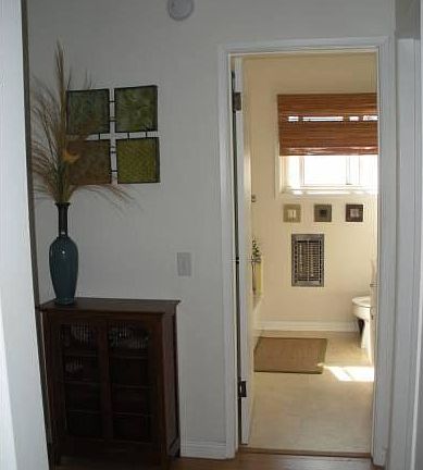 hallway to bathroom & bedrooms