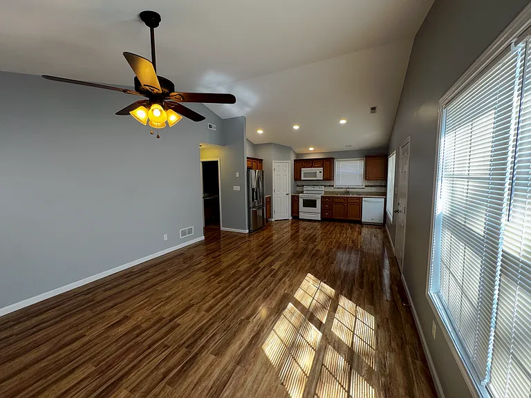 Main living area with newly installed blinds.