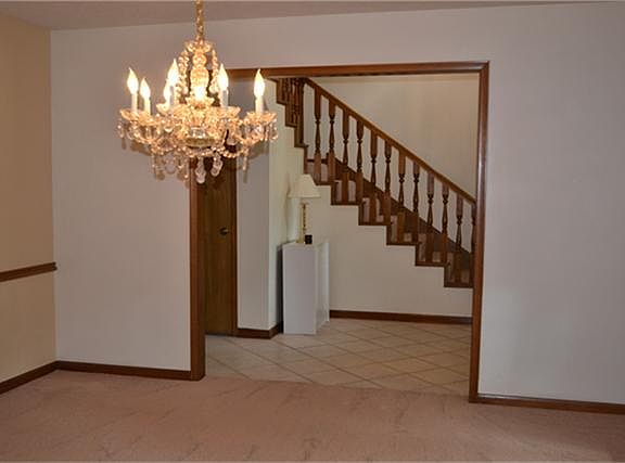 Formal Dining Room with New Carpet.
