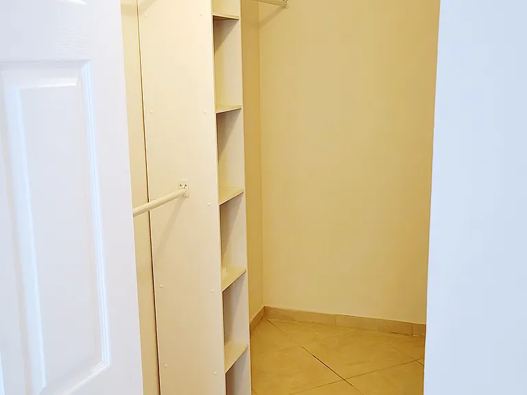 Walk-in-closet w/plenty of space, plus attic storage!