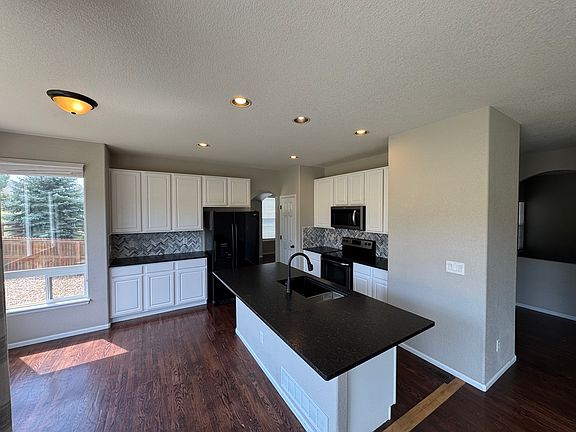 Kitchen
Fresh painted cabinets and new granite countertops
