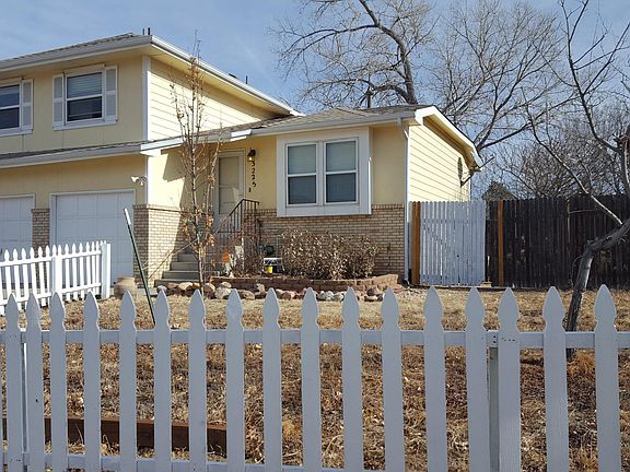 FRONT WITH FENCE