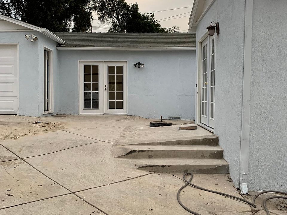 Back entrance on left to master bedroom and on the right, kitchen entrance. Wheelchair accessible.