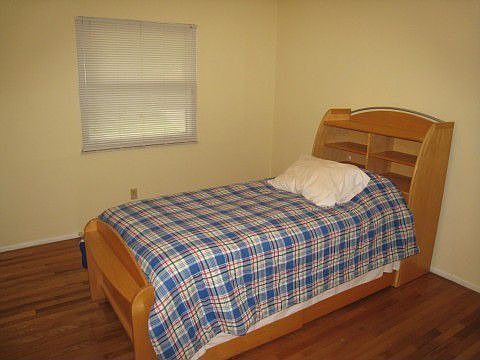 Bedroom 1 hardwood floors, new paint