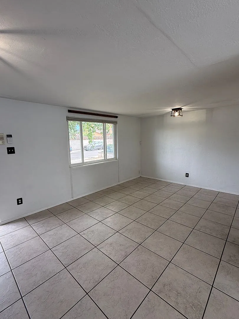 Pride of Ownership beams from this NE Heights 3 Bedroom 1.5 Bath home — Photo 2