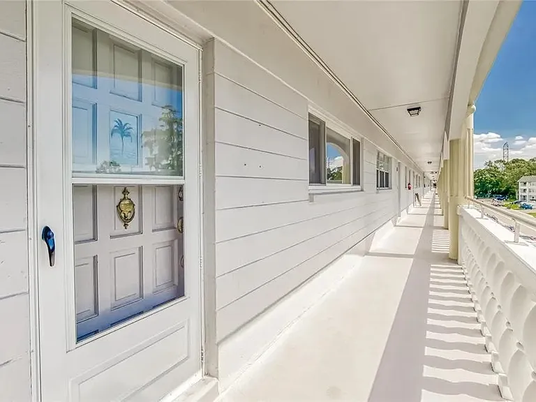 Exterior view looking east towards the elevator which is located in the center of the building. (longer distance)