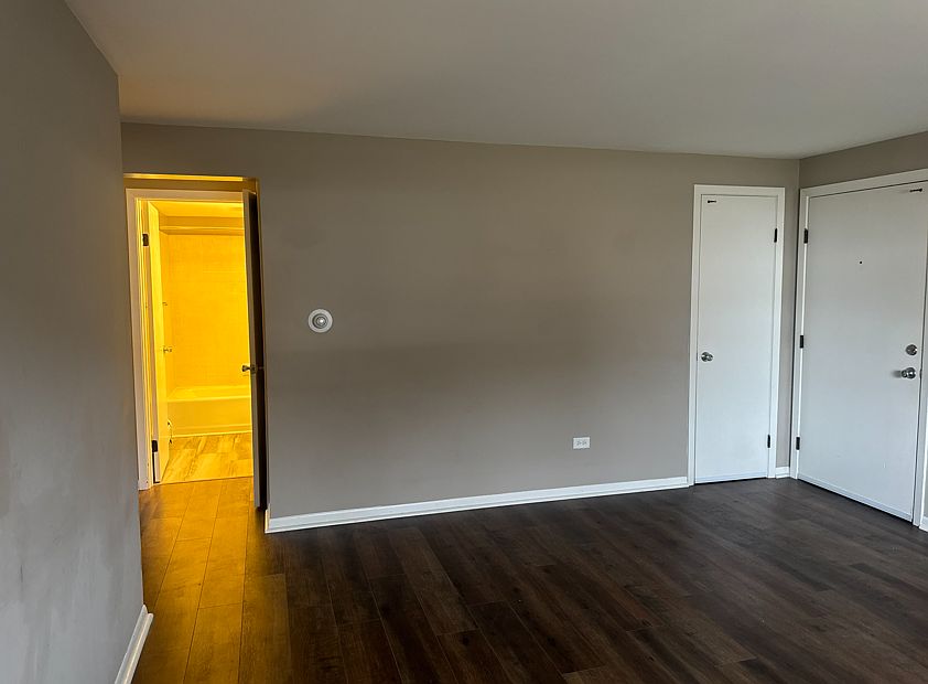 Living room, coat closet entrance
