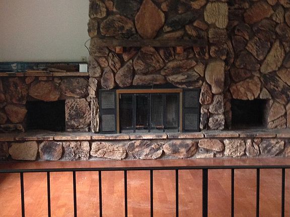 Upstairs Living Room with fireplace and brand new hardwood f